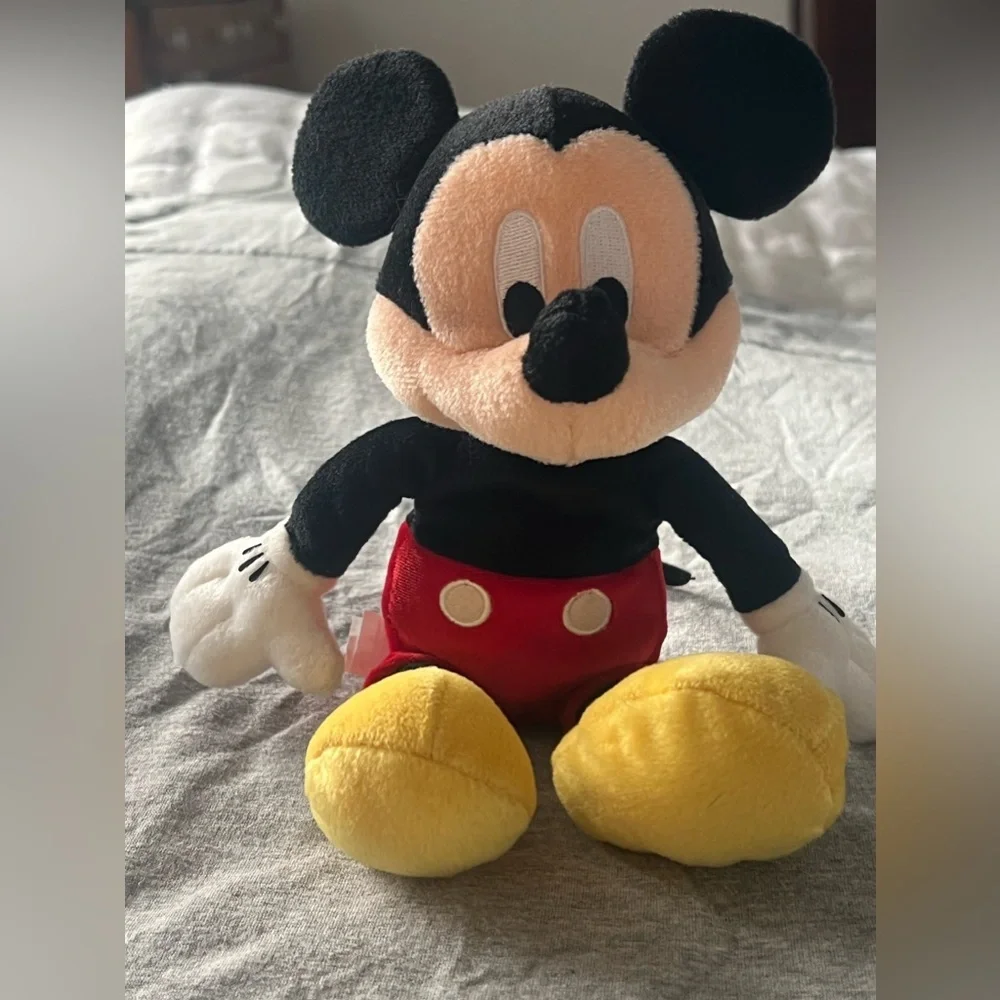 Small Mickey Mouse stuff animal with little bean bag in butt